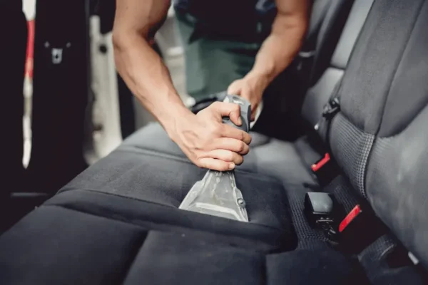 car seat being vacumed